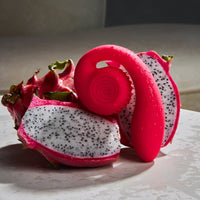 SVibe Gizi Lite Dual G-Spot Stimulator in Dragonfruit, paired with a real dragonfruit for a playful touch #color_dragonfruit