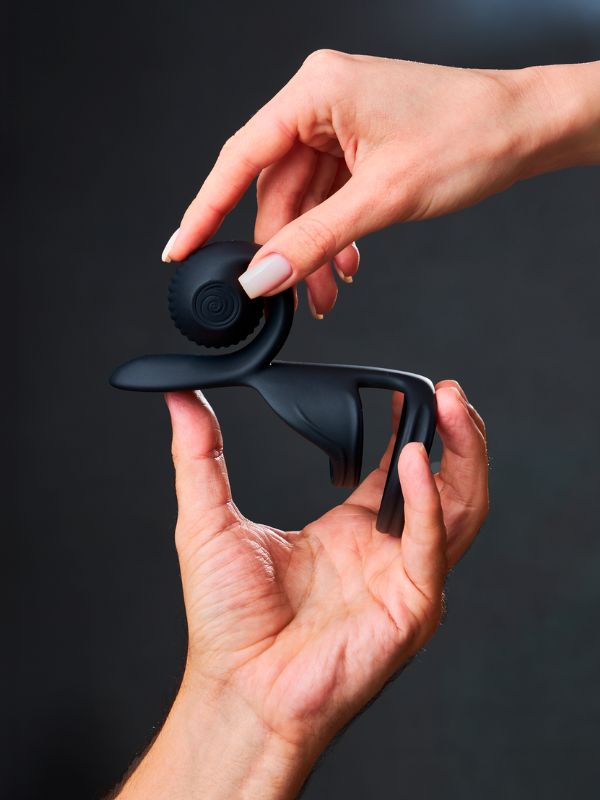 Svibe Snail Jovi Dual Couples Stimulator in black. Man and woman holding the sex toy. 